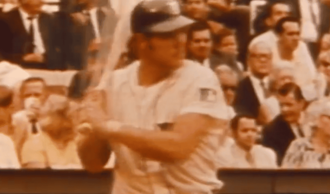Bill Freehan in action, showcasing his defensive skills as a catcher.
